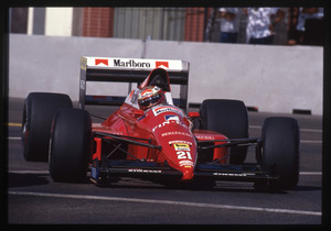 Il pilota Alex Caffi (n. 21) su Dallara-Ford gommata Pirelli