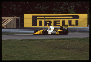Il pilota Pierluigi Martini (n.23) su Minardi-Ford gommata Pirelli