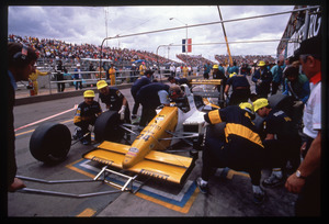 Il pilota Paolo Barilla (n.24) al pit lane Minardi