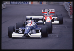 Il pilota Jean Alesi (n.4) su Tyrell-Ford gommata Pirelli durante la stagione 1990